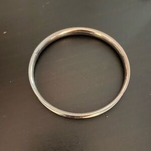 2 for $10 Silver toned bracelet with x type engraving